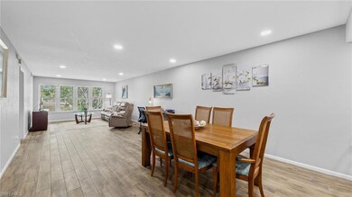 Dining area with recessed lighting, wood finished 