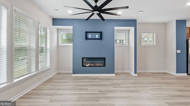 Electric color changing fire place and HUGE fan!