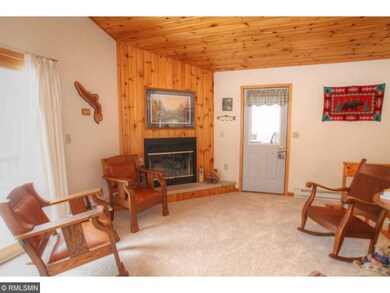 Wood burning fireplace and newer carpet in the liv