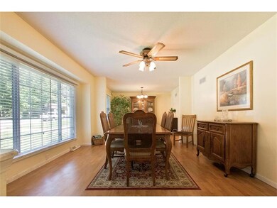Formal living room opens into dining room.