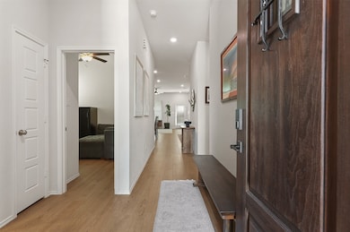 This photo showcases a welcoming entryway with woo