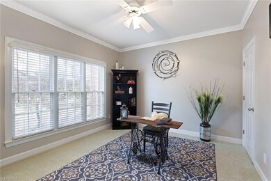 Currently used as an office, this is a main level bedroom with full bath access.