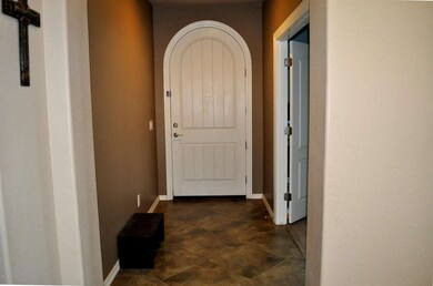 10856Reginal_Entrance into Home