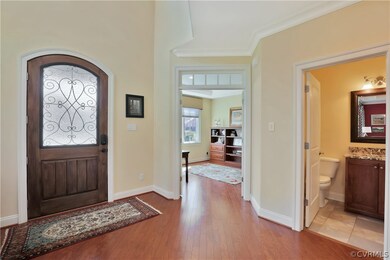 View of the front door showing the office and firs