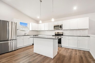 The kitchen includes Quartz counters with subway t