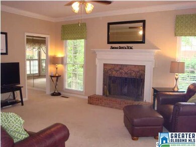 Another view of family room opening into living ro