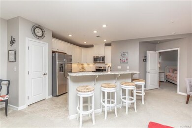 Ceramic tile, recessed lighting, and spacious pant