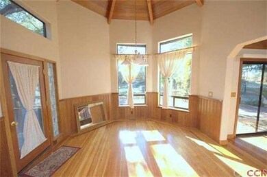 Enjoy serene views of the oak studded property fro