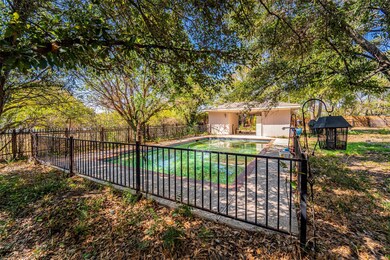 A lovely fenced pool, completed with pool house (bathroom & dressing areas) awaits your delight. There is plenty of yard left for gardening, pets, or play!