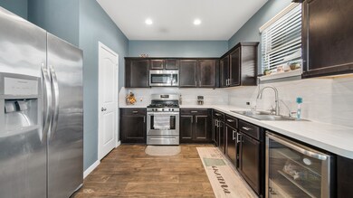 Chef's kitchen complete with stainless steel appliances.