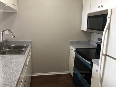New stainless steel appliances. Refrigerator is in