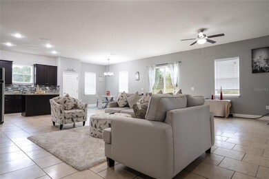 Spacious main living area towards kitchen and dining area.
