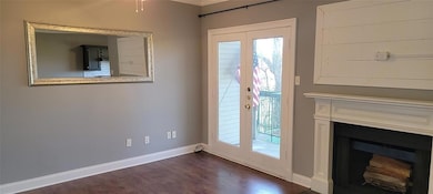 Doorway featuring french doors, dark hardwood / wo