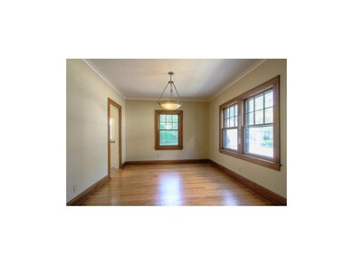 Dining room also has fresh paint and refinished ha