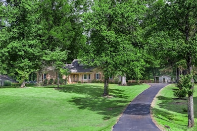 House is set back from the road for added privacy.