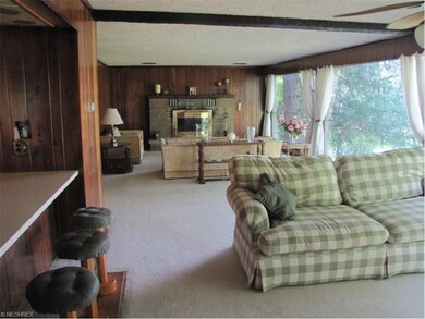 great room with two sitting areas, sit down counte