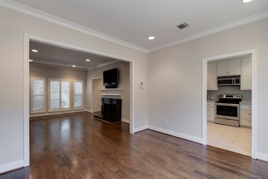 Spacious dining room off the kitchen has hardwood
