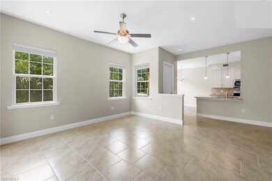 Living Room with view into Open Kitchen and Dining