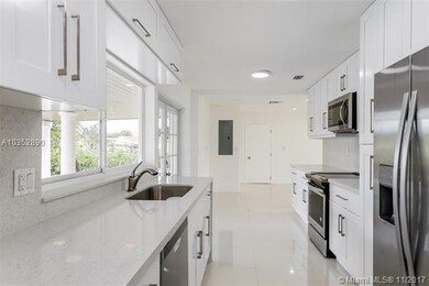 Kitchen quartz counter tops, SS appliances, open a