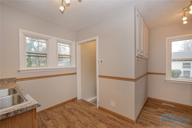 Stairway takes you down to back door and finished