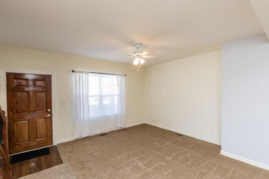 Front living room toward entry.