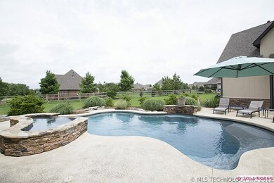 Sparkling Pool features beach area, stacked stone