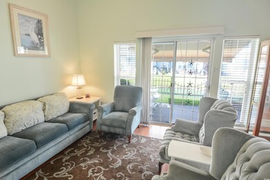 Living room featuring hardwood / wood-style floori