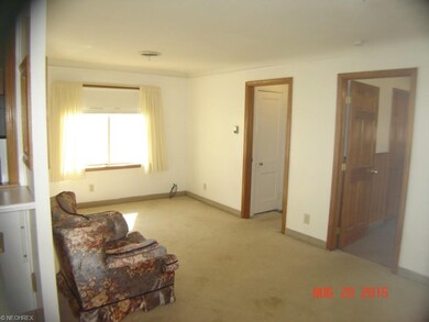 Family room is off kitchen and it, too, is a brigh