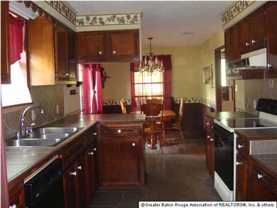Spacious Kitchen opens up to Dining area