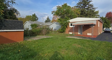 1230 E Decamp St, Burton, MI 48529 - photo 2