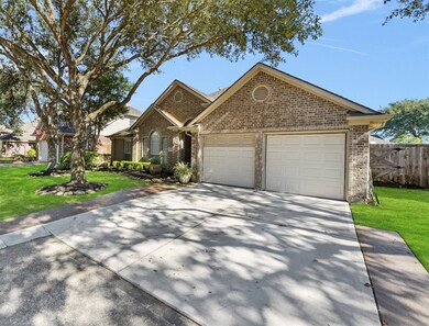 Two car garage with a newly widened driveway!