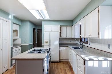 12280 E Vassar Dr, Aurora, CO 80014 - photo 7