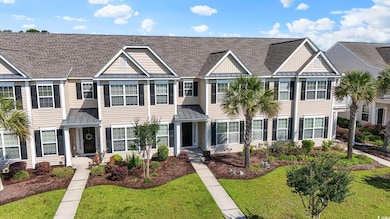 View of property with a standing seam roof, metal 
