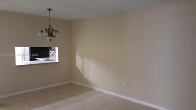 15969 NW 64th Ave unit 105, Miami Lakes, FL 33014 - photo 2
