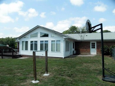 Large level fenced back yard
