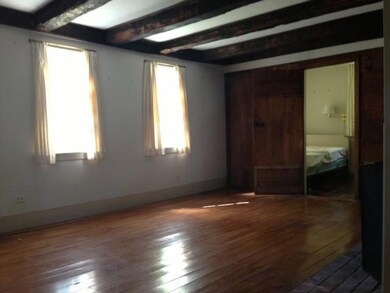 Living room with refinished floors...
