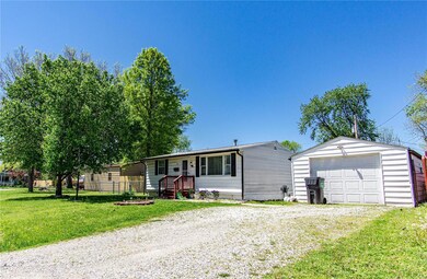 Front of house with 1 car garage