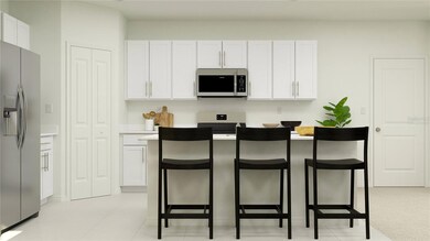 Virtually staged. Kitchen