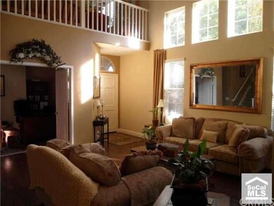 Cathedral Ceilings accent this beautiful living ro