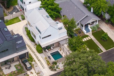 View from above of property featuring a pool