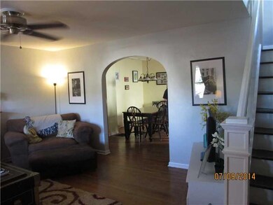 Living Room. Notice graceful arch flowing into the