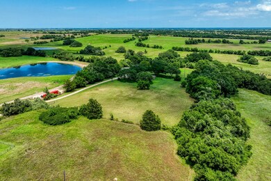 Surrounded by lush landscaping and a beautiful mix
