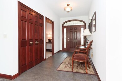 Grand Formal Entry With Large Format Tile and Ampl