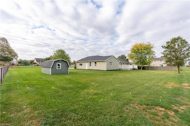 View of yard with a shed