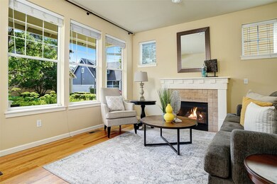 Lovely entry and wall of windows make this Living Room a very inviting space.