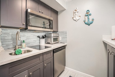 Remodeled kitchen with quartz countertops!