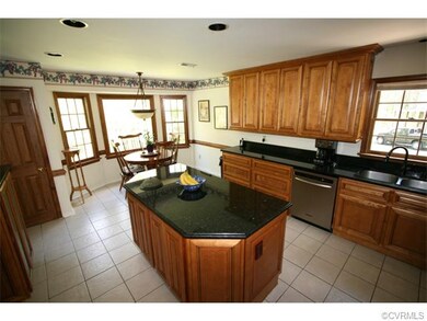 Granite counter tops. Cabinets on all 3 sides, plu