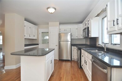 Kitchen with center island for additional sitting