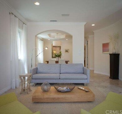 FORMAL LIVING ROOM OPENS TO DINING ROOM 