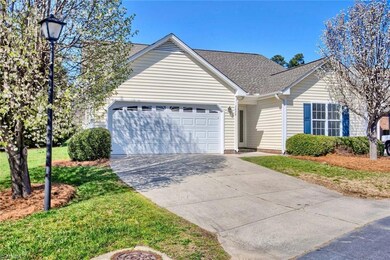 End unit. Two car garage, level driveway and guest parking across the street. Lighted, tree-lined street. Low maintenance vinyl siding, windows. Architectural shingles.